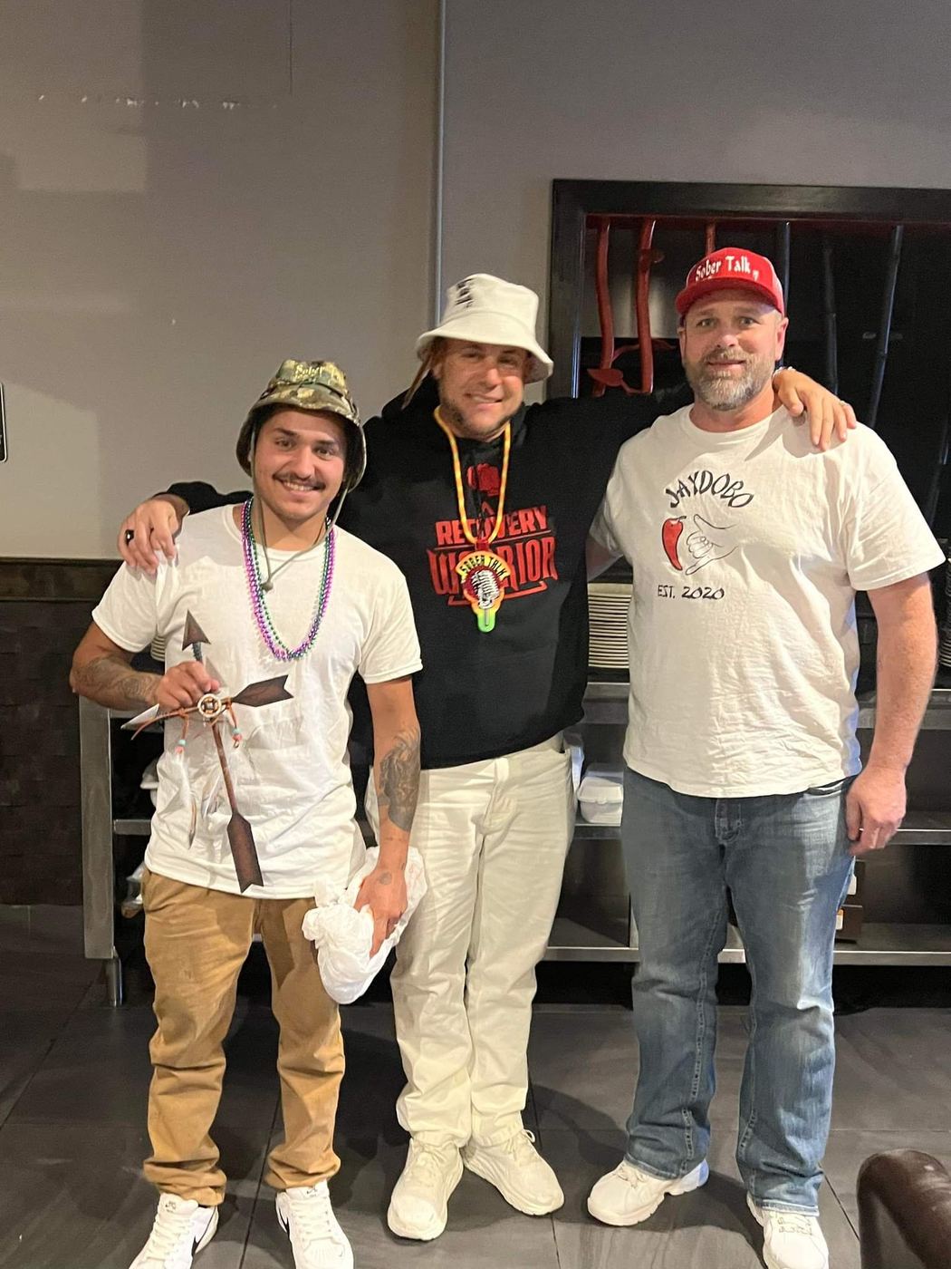 Brandon with two friends at an event